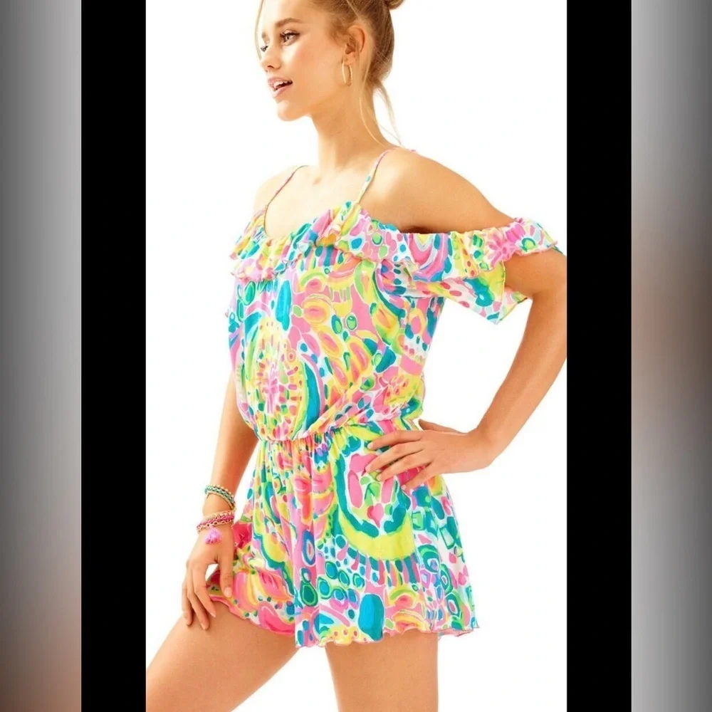 Lilly Pulitzer Vibrant Pink and Green romper.